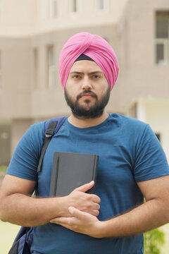 Vertical Photo of Serious Sikh Indian Student Looking at Camera