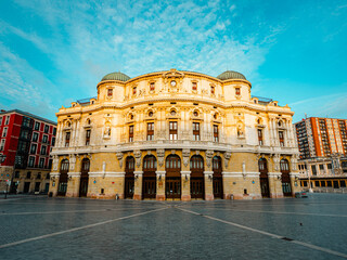 Majestic Arriaga Theatre bathed in golden light, a stunning architectural gem in Bilbao's historic...