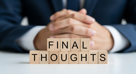 Obraz premium Wooden Blocks Spelling Final Thoughts Businessperson Hands