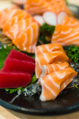 Plate of Fresh slice fresh salmon fish and tuna. Japanese food