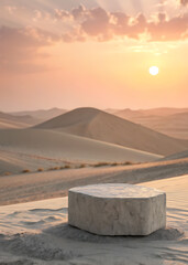 Serene desert landscape with a stone pedestal at sunset