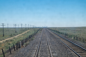 Obraz premium Railroad Tracks at Sunset in Kazakhstan