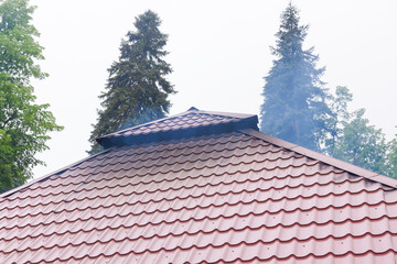 Red roof with a chimney on top