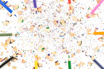 Colored pencils and shavings frame with border for text. Back to school concept with copy space