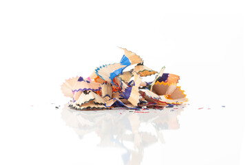 Colorful pile of pencil shavings from sharpening. A concept of art, creativity, and education...