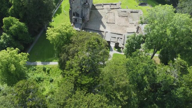 slow arial drone footage of scottish huntly castle ruin epic dramatic views closeup abandoned building tourist attraction no people