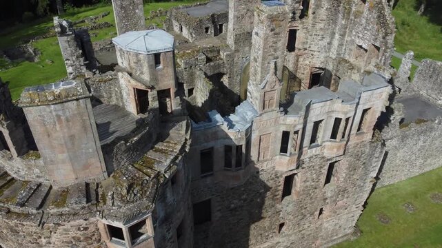 slow arial drone footage of scottish huntly castle ruin epic dramatic views closeup abandoned building tourist attraction no people