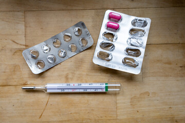 tablets and thermometer