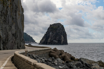 rock at the seaside road
