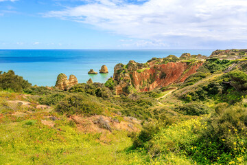 Ponta da Piedade - famous rock formations with caves and grottoes on the ocean shore in Lagos,...