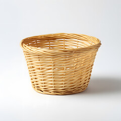 Obraz premium Empty bamboo wicker basket on white background. Minimalistic and rustic design perfect for eco-lifestyle or storage visuals. Isolated product mockup.