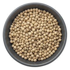 Close-up of white peppercorns in a bowl highlighting texture and natural color