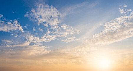 Morning sunrise sky background, Sunset sky cloud with blue, orange, yellow sunlight warm, Horizon landscape golden sky in summer season majestic sunny bright nature background