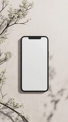 Modern smartphone with blank screen surrounded by delicate white flowers and soft shadows on a textured background. Ideal for app design, UI showcase, or social media branding.