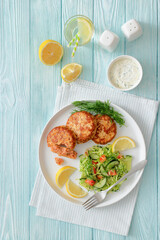 Hot Smoked salmon burgers, patties and coleslaw