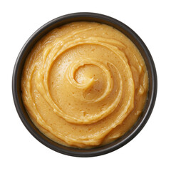 Fototapeta premium Creamy peanut butter in a black bowl with a smooth swirl, set against a plain background