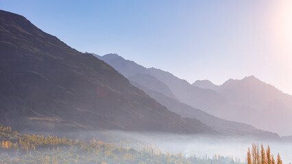 The autumn scenery with Hindu Kush mountain range in the background is very beautiful, Gahkuch,northern Pakistan.