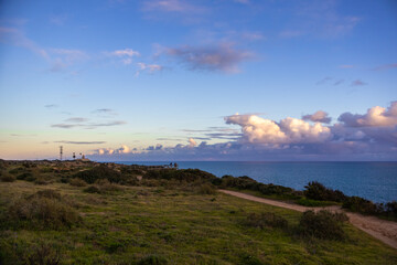 Ponta da Piedade - famous rock formations with caves and grottoes on the ocean shore in sunset time...