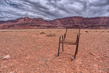 Abandoned lawn chair near Echo Cliffs viewed from US89A Arizona