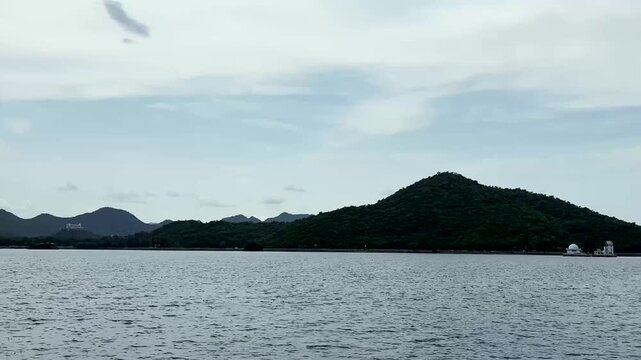 Dramatic Sky over Lake Fateh Sagar with Distant Aravalli Mountain Range in Udaipur, Rajasthan
