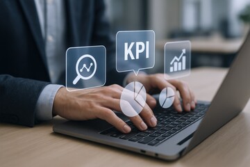 Business professional analyzing digital KPI metrics on a laptop in a modern office setting with futuristic data icons and growth charts