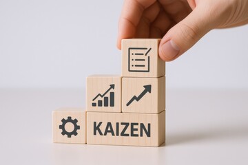 Business Growth Strategy Concept with Wooden Blocks Showing Graphs and Text Kaizen for Continuous Improvement and Process Optimization