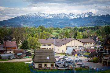 Where mountains watch over homes