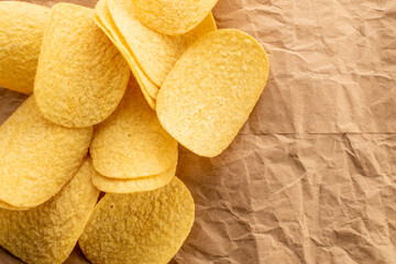 Crispy potato chips, top view, macro.