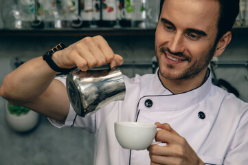 A skilled barista pours coffee with precision, showcasing the art of coffee making in a modern cafe...