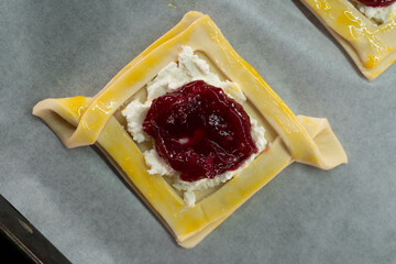Puff pastry with jam and cream cheese. Dessert. Pastries. Food concept