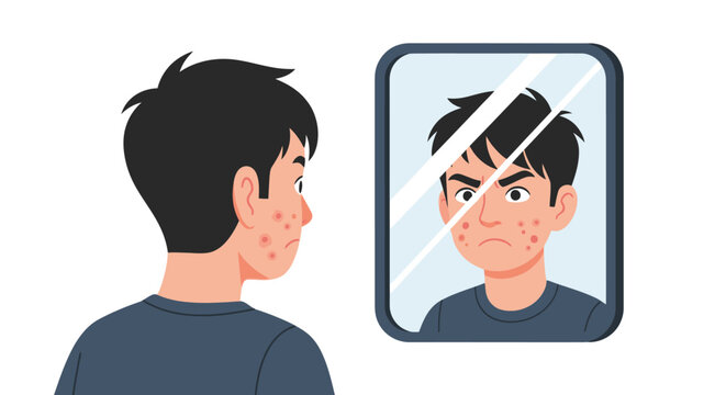 Young man looking at his reflection, feeling frustrated by acne and skin problems