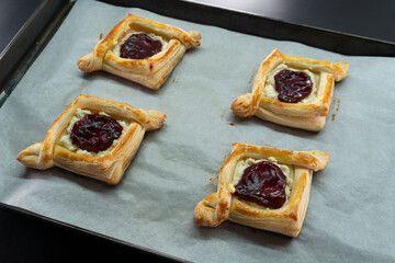 Puff pastry with jam and cream cheese. Dessert. Pastries. Food concept