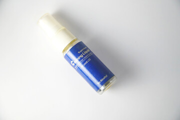 a cleaning kit bottle for camera on white background