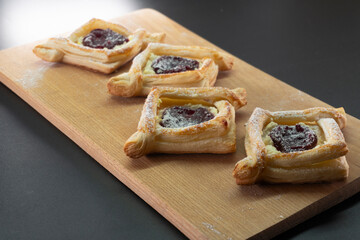 Puff pastry with jam and cream cheese. Dessert. Pastries. Food concept