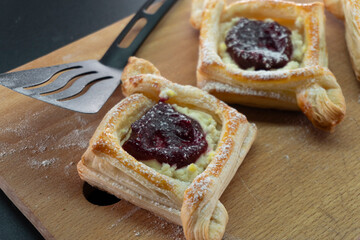 Puff pastry with jam and cream cheese. Dessert. Pastries. Food concept