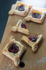 Puff pastry with jam and cream cheese. Dessert. Pastries. Food concept