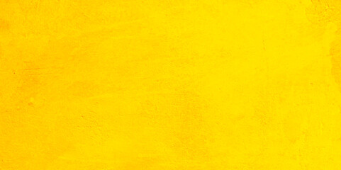 beautiful abstract grungy yellow stucco wall background in cold mood. pantone of the year color concept background with space for text.
