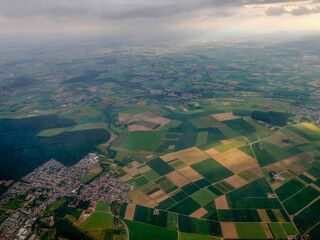 Area near Frankfurt Germany aerial view at sunset from airplane window before landing at airport