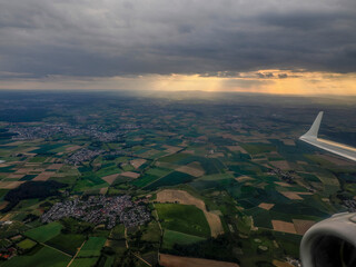 Area near Frankfurt Germany aerial view at sunset from airplane window before landing at airport