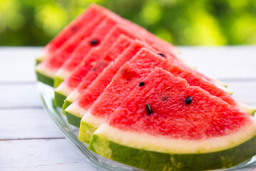 Fresh sliced watermelon outdoors, delicious summer snack