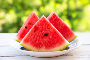 Fresh sliced watermelon outdoors, delicious summer snack