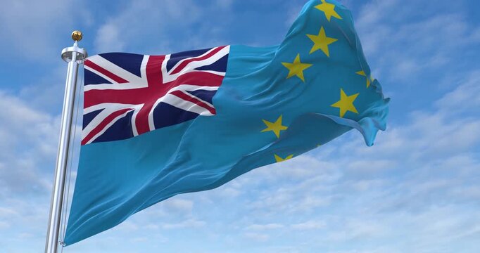 Tuvalu flag with flagpole waving in wind, rolling clouds background looping, 4K video (Perfect Loop)