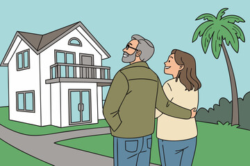 couple in front of their house
