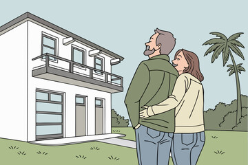 couple in front of home