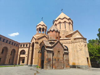 Ancient church in Yerevan, Armenia, with iconic Armenian architecture under a clear blue sky on a sunny day