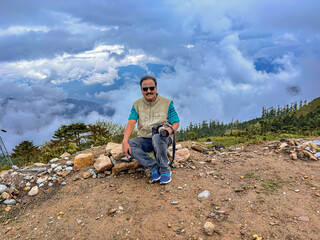Naklejka premium Handsome tourist traveler man at Dochula pass Bhutan