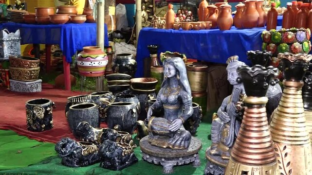4K Video of Handcrafted Pottery and Clay Art Display at Outdoor Craft Market