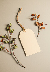 Blank kraft paper tag with dried flowers and twine