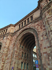 Historic building in Yerevan, Armenia, with elegant arches and columns, captured on a bright clear...
