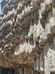 Symphony of Stones in Armenia, a natural rock formation with stunning basalt columns reflecting in...